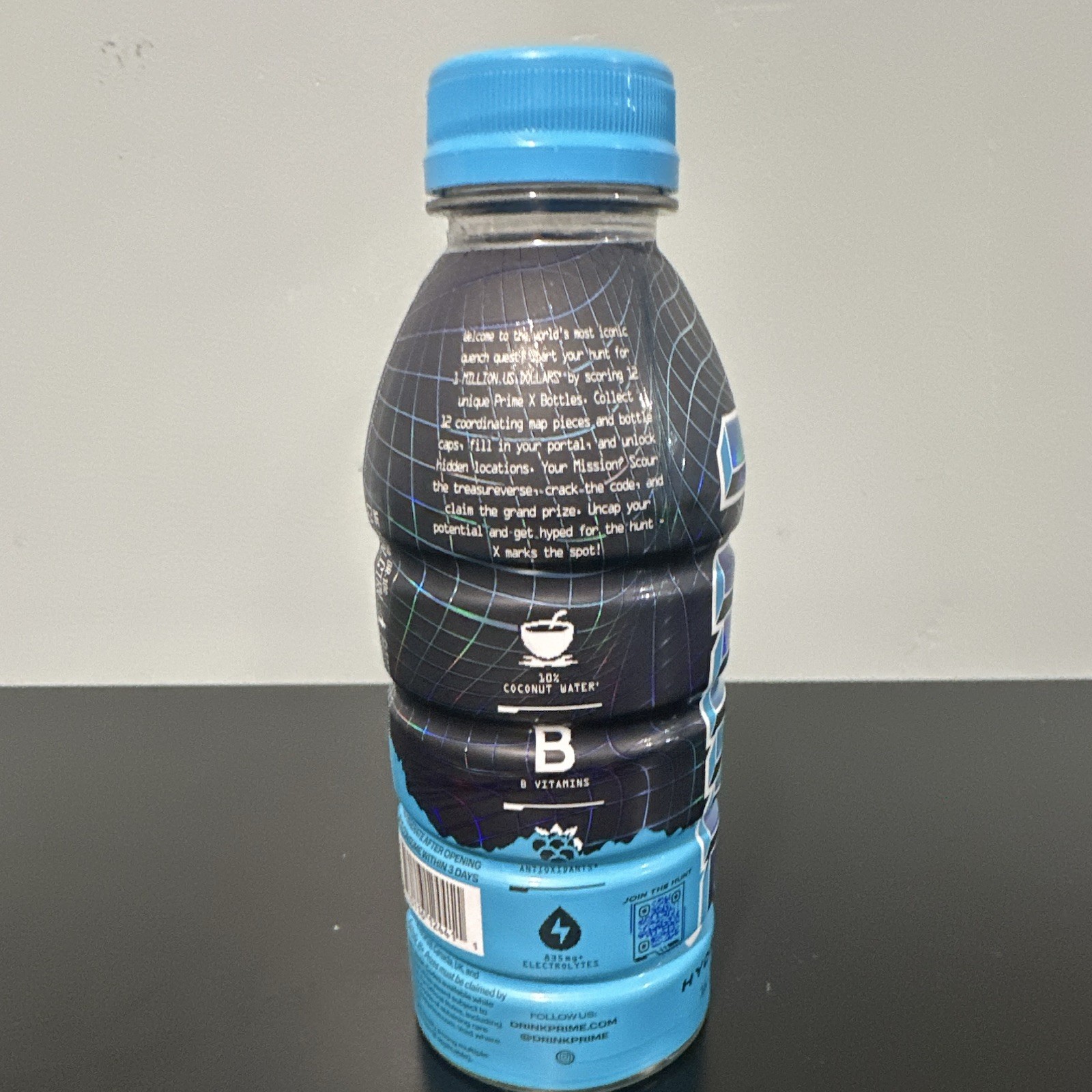 PRIME Hydration Electrolyte Drink X treasure hunt blue holo 16.9 fl oz (expired)