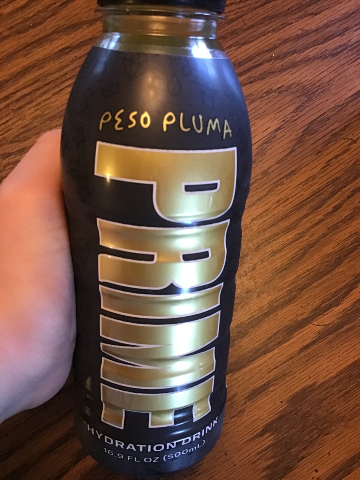 BRAND NEW black Peso Pluma Prime Hydration Drink U.S.A bottle orange and mango