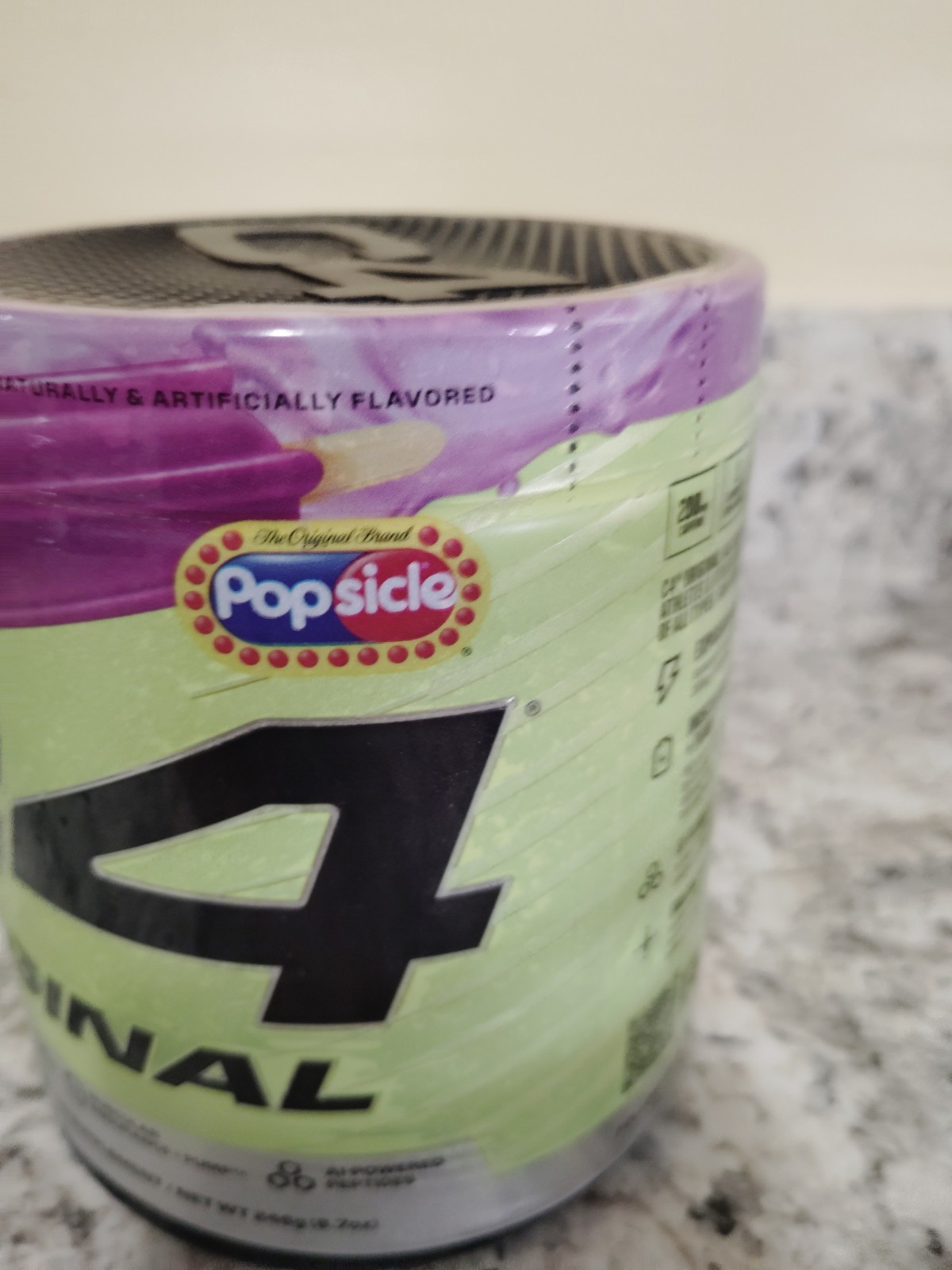This is a Cellucor C4 Original Pre-Workout powder in the Grape Popsicle flavor.