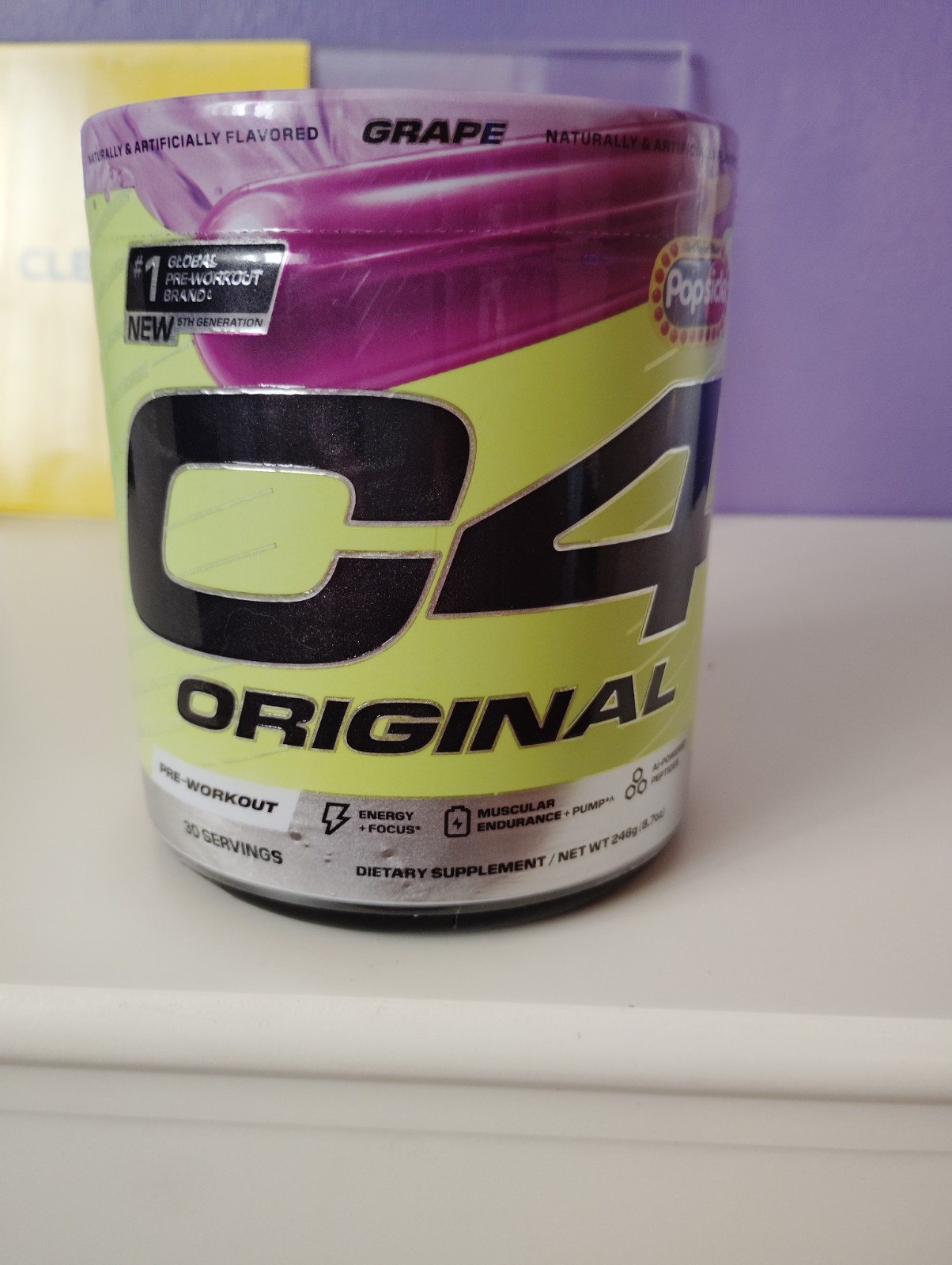 This is a Cellucor C4 Original Pre-Workout powder in the Grape Popsicle flavor.